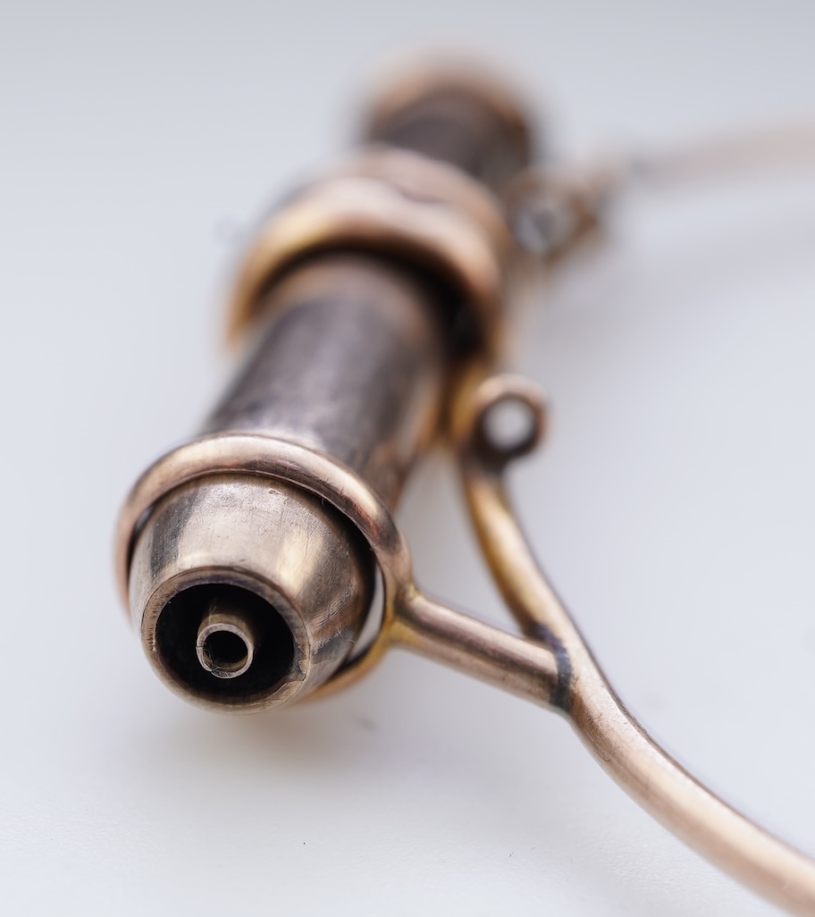 A gold bracelet and propelling pencil, first half 20th century
